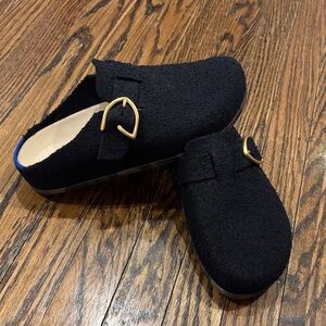 Rothy’s Black Boucle Gold Buckle Clogs